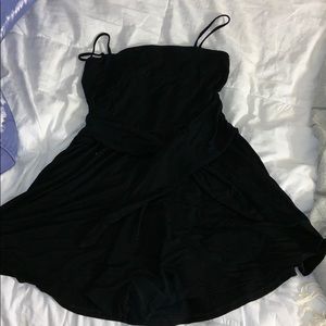 Black romper with a tie in the front